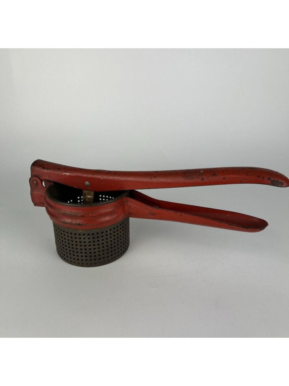 Vintage Metal Potato Ricer Fruit Press Red Handle Kitchen Utensil